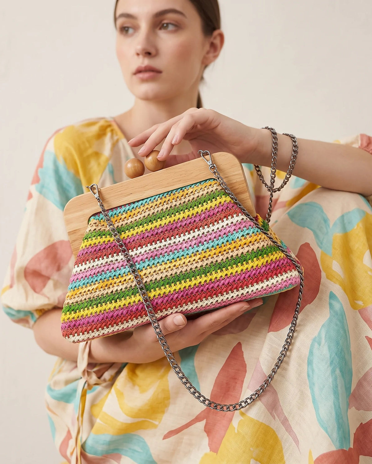 a woman holding a clutch bag