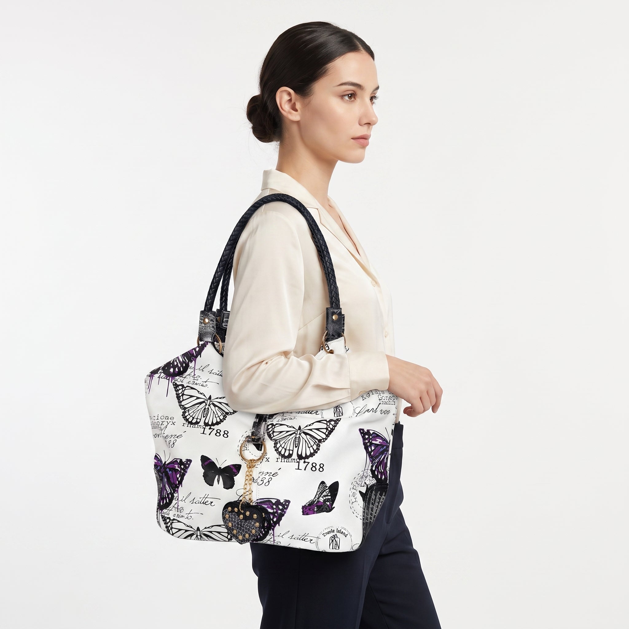Borsa Adelina a Mano in Canvas Farfalle con Manici Intrecciati e Charm - Stile Donna Bags