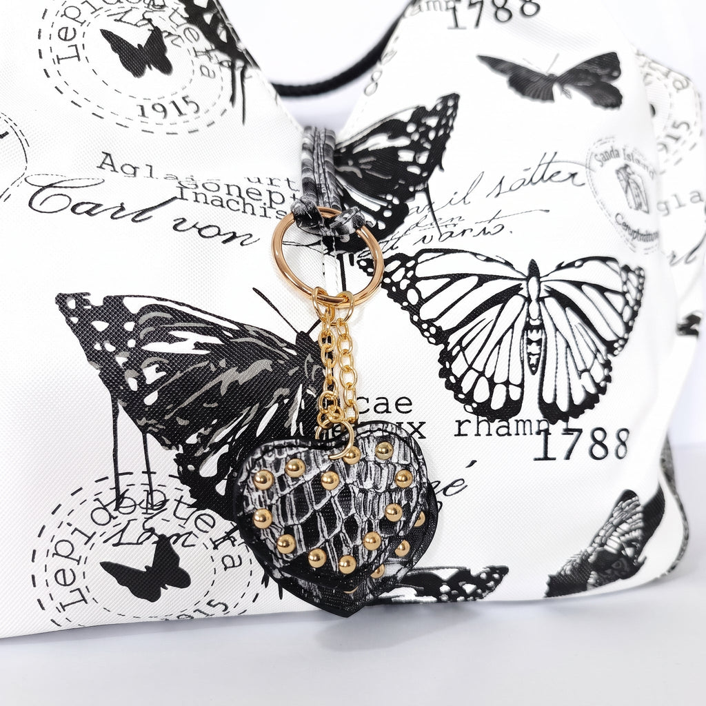 Borsa Adelina a Mano in Canvas Farfalle con Manici Intrecciati e Charm - Stile Donna Bags