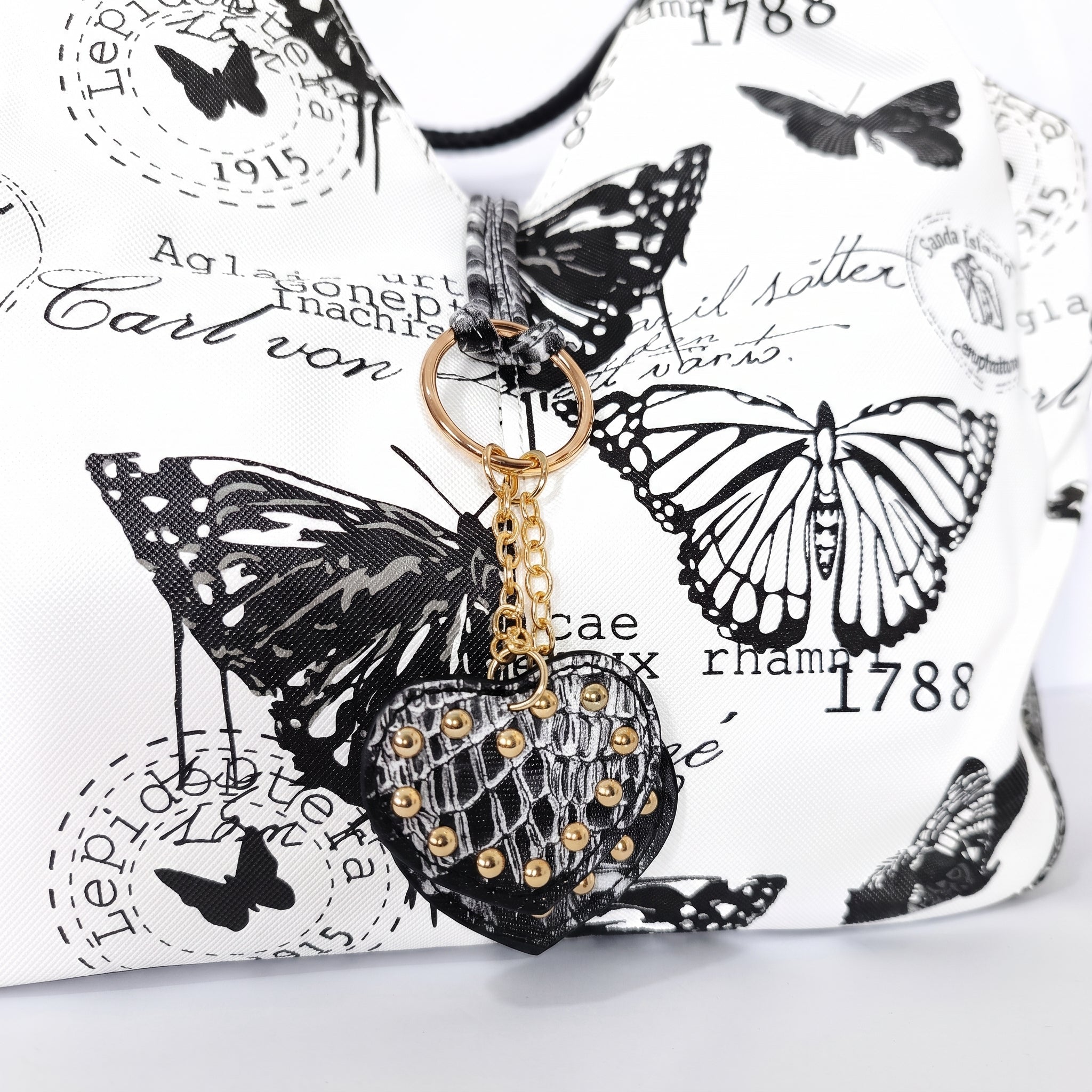 Borsa Adelina a Mano in Canvas Farfalle con Manici Intrecciati e Charm - Stile Donna Bags