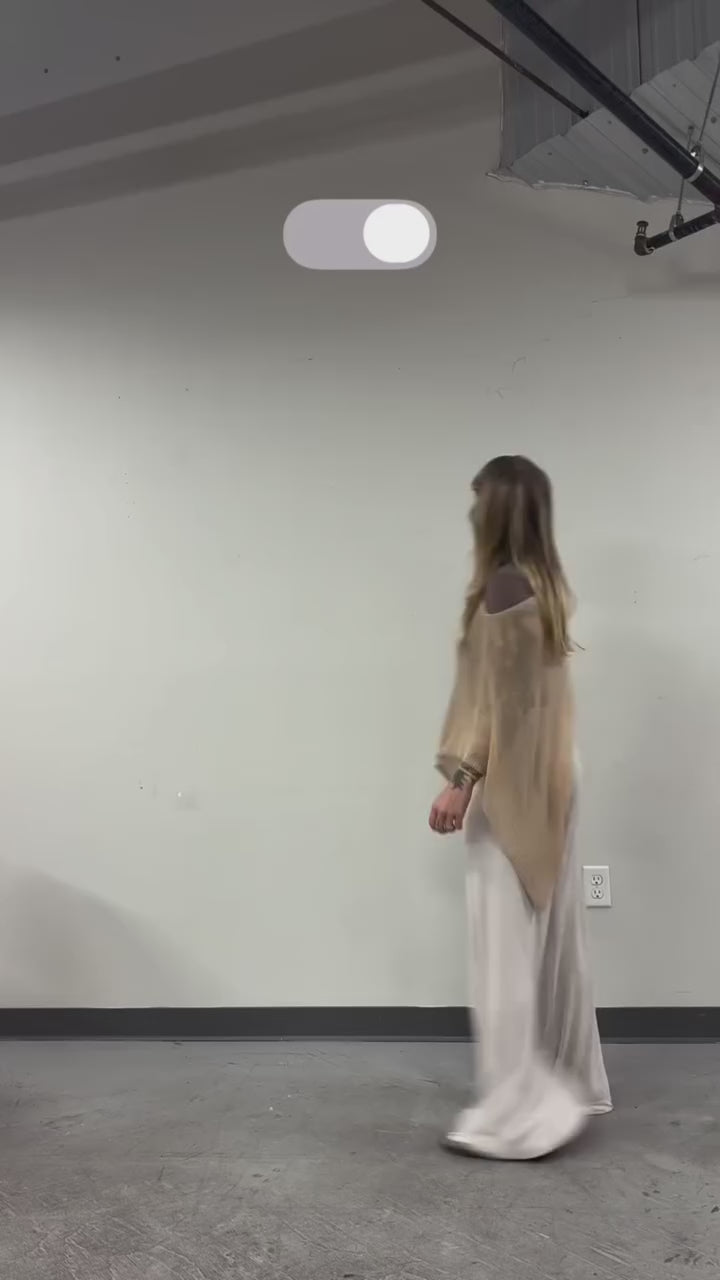 A woman trying to switch on the light 
