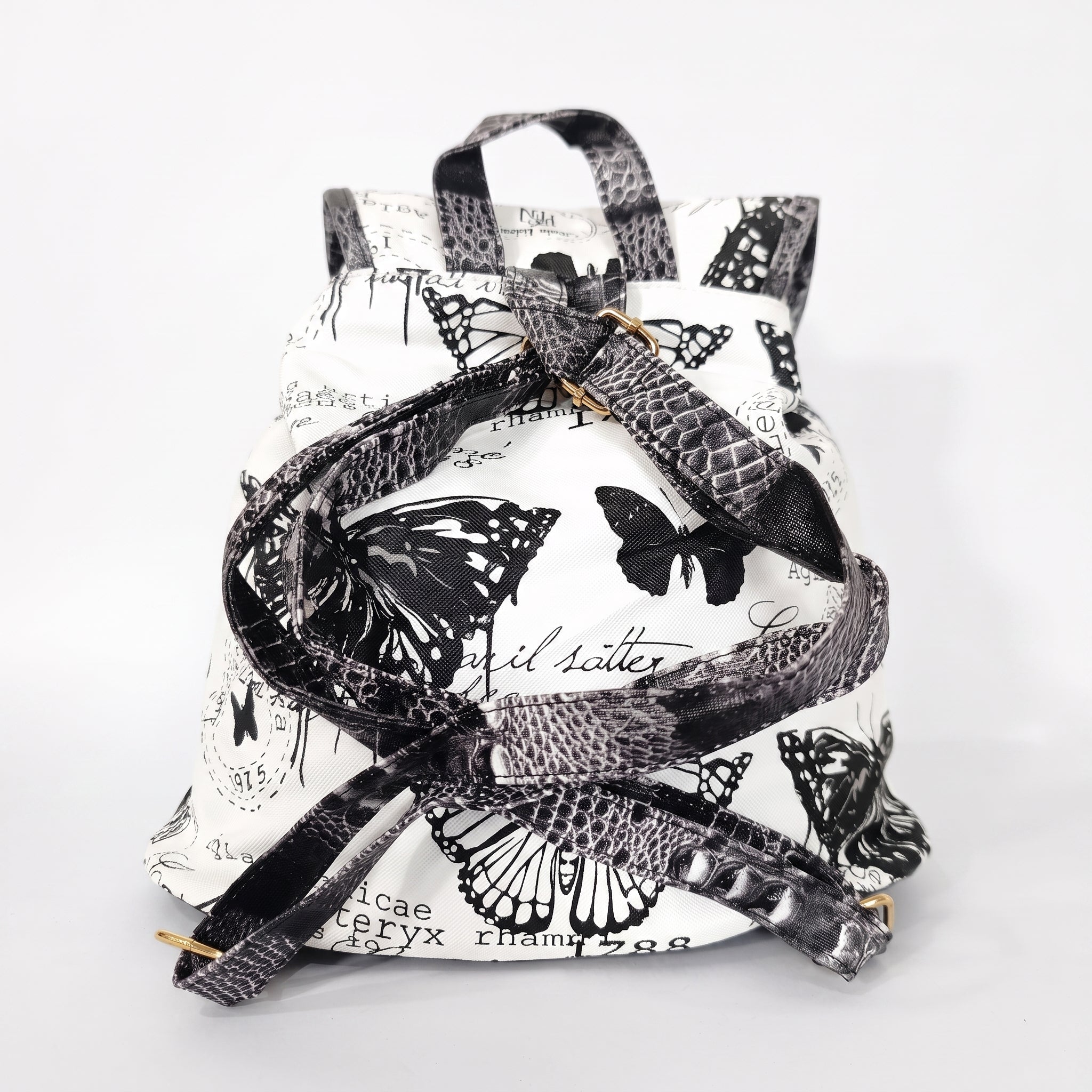 Zaino Adelina in Canvas Farfalle con Rifiniture in Ecopelle e Coulisse - Stile Donna Bags