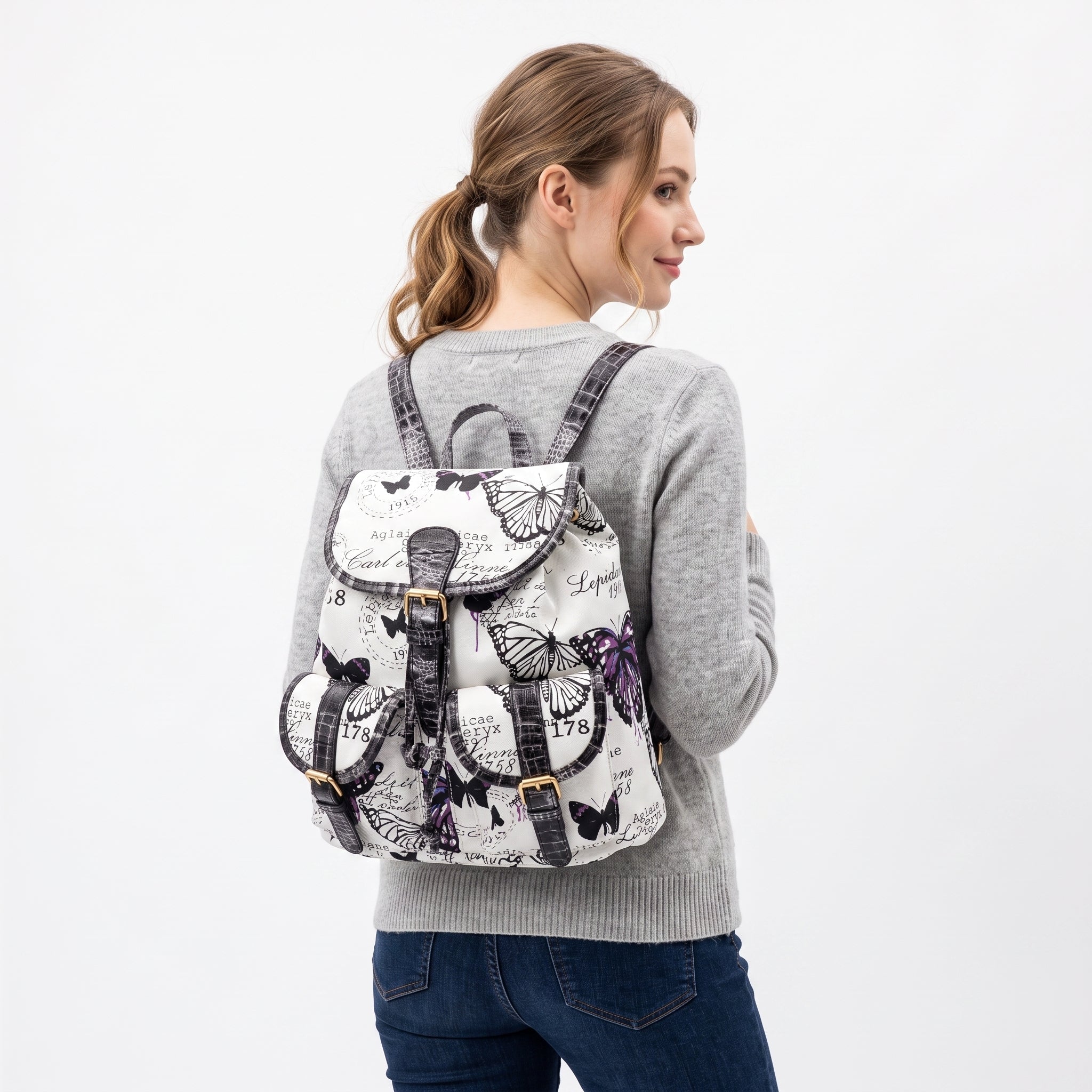 Zaino Adelina in Canvas Farfalle con Rifiniture in Ecopelle e Coulisse - Stile Donna Bags
