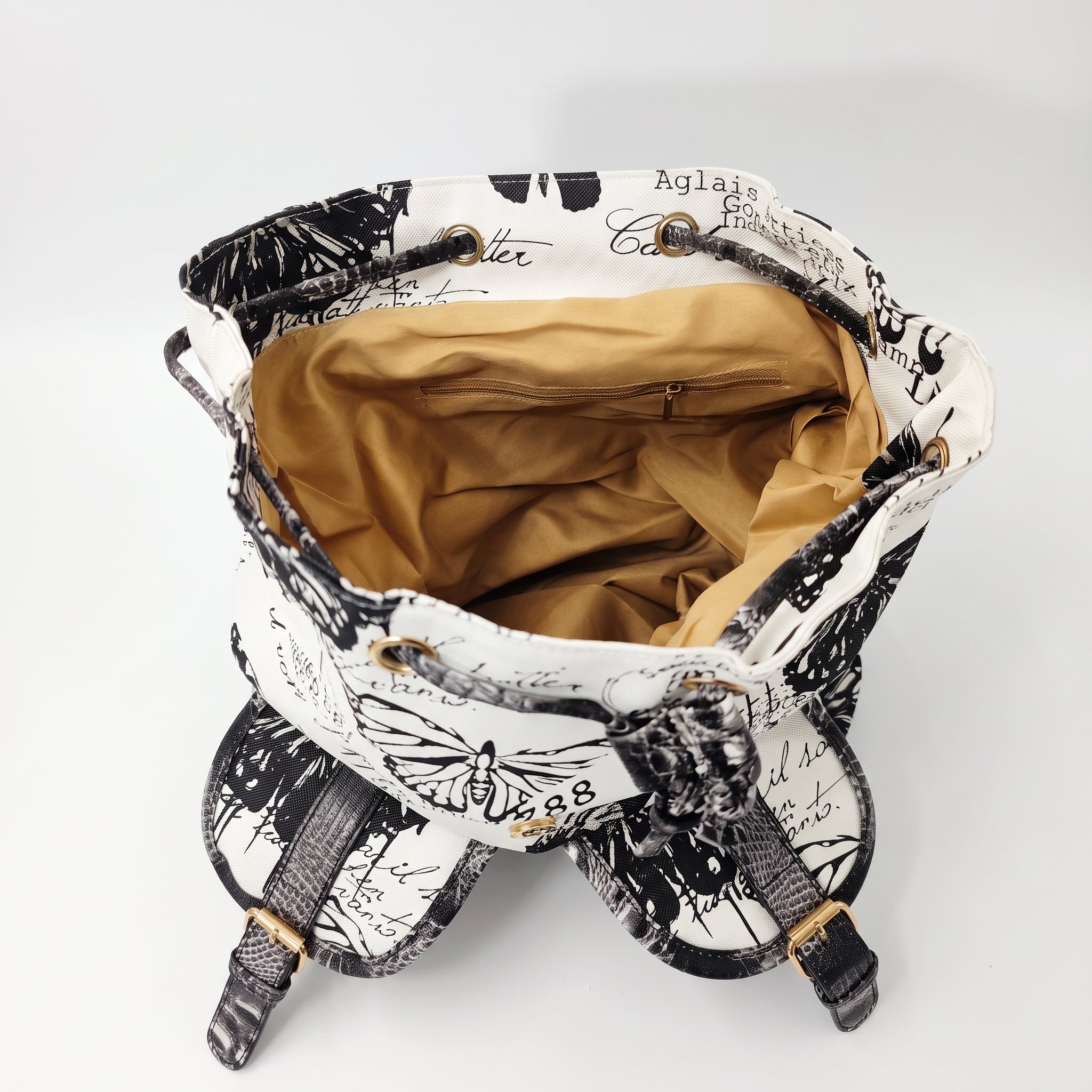 Zaino Adelina in Canvas Farfalle con Rifiniture in Ecopelle e Coulisse - Stile Donna Bags
