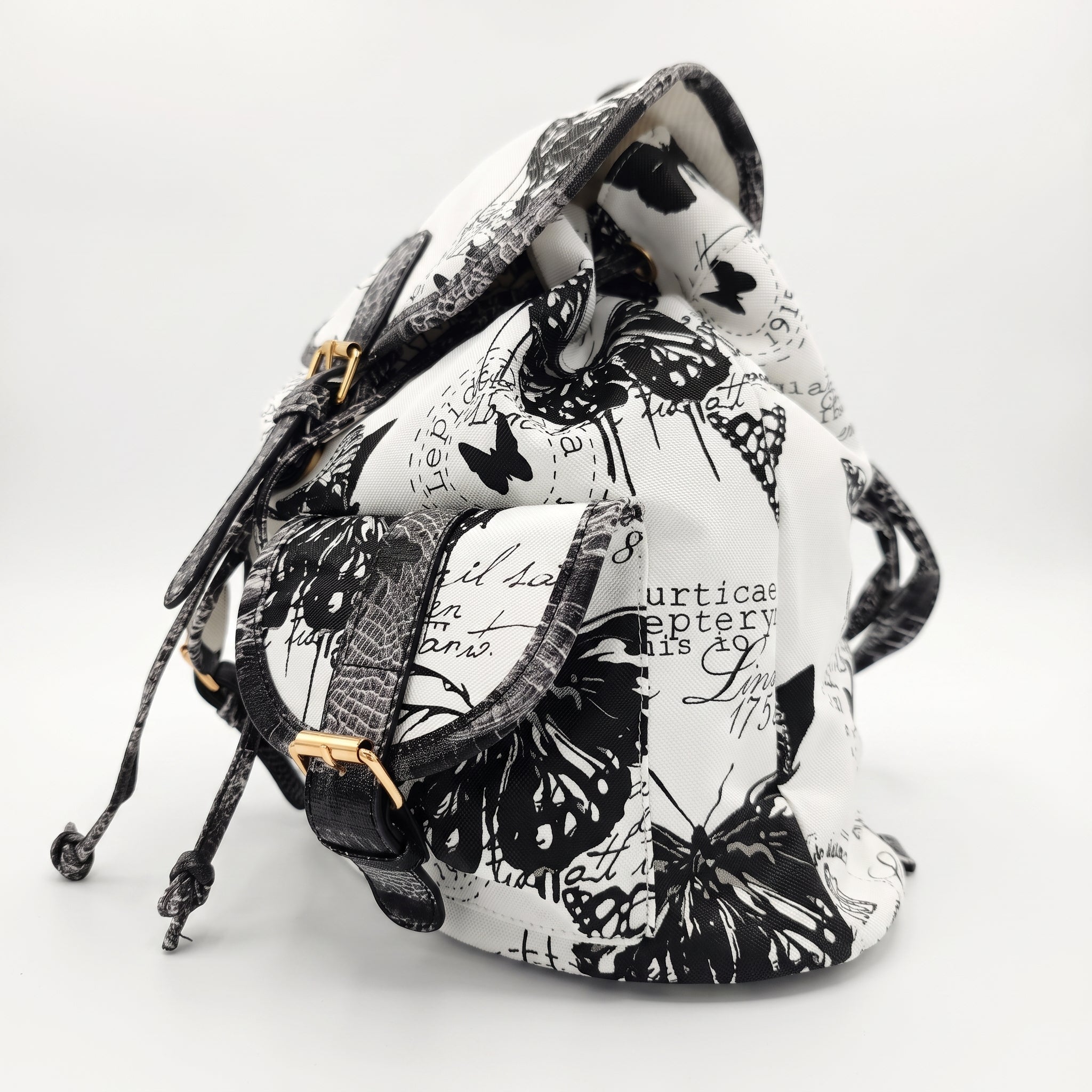 Zaino Adelina in Canvas Farfalle con Rifiniture in Ecopelle e Coulisse - Stile Donna Bags